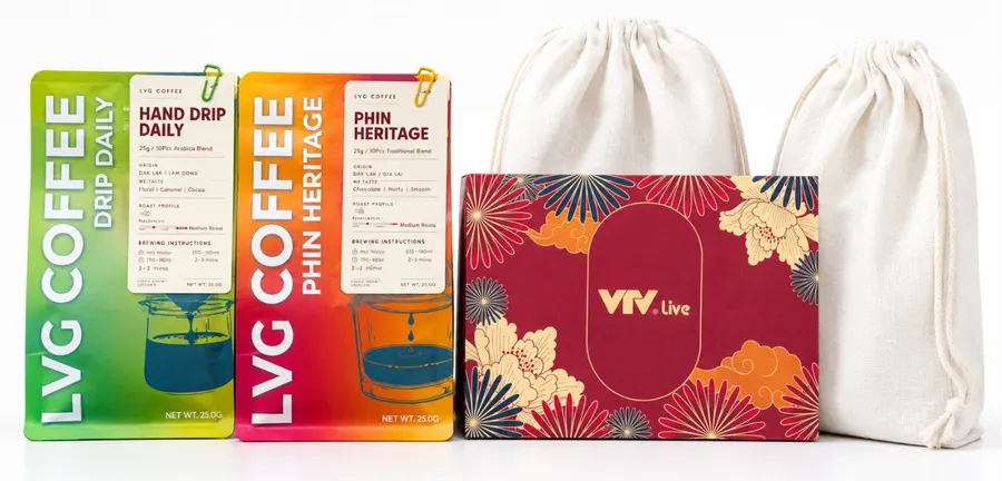A corporate gift set: two Lien Viet Green coffee packs, a branded gift box and cotton pouches