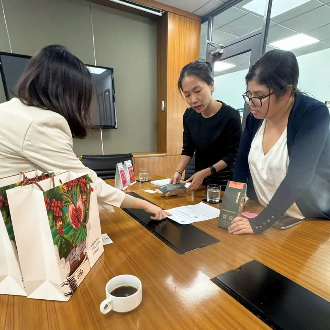 Lien Viet Green team presenting coffee samples at Embassy of Peru meeting